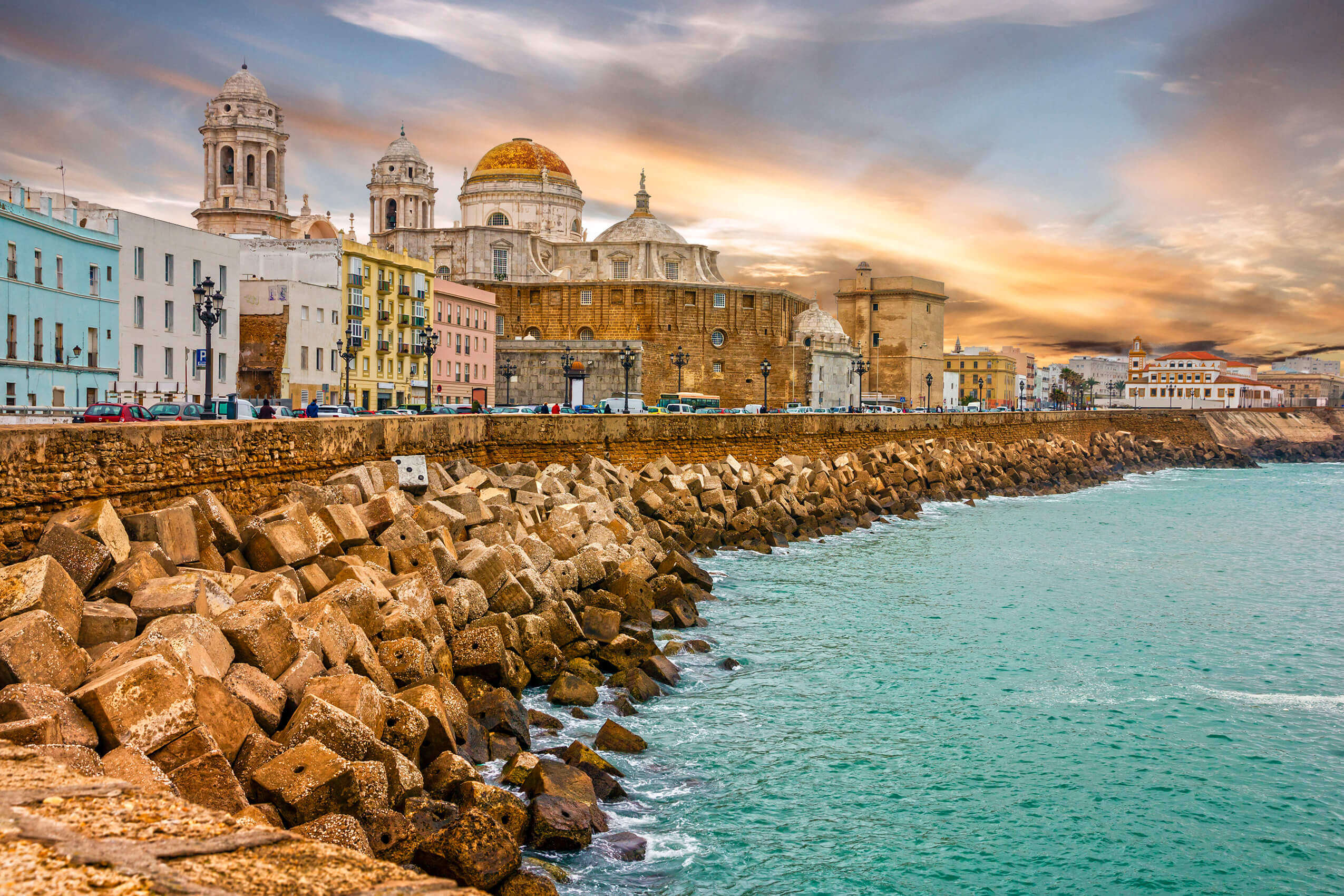 Cádiz cathedral and Atlantic seafront at sunset, one of the oldest cities in Andalusia