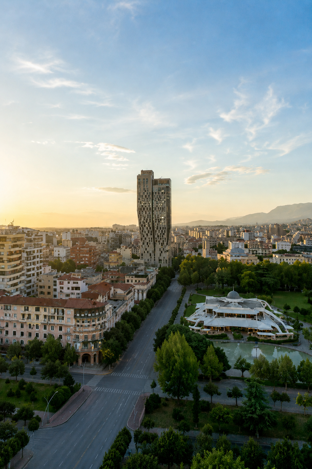 Tirana city skyline at dusk with the TID Tower and central boulevard