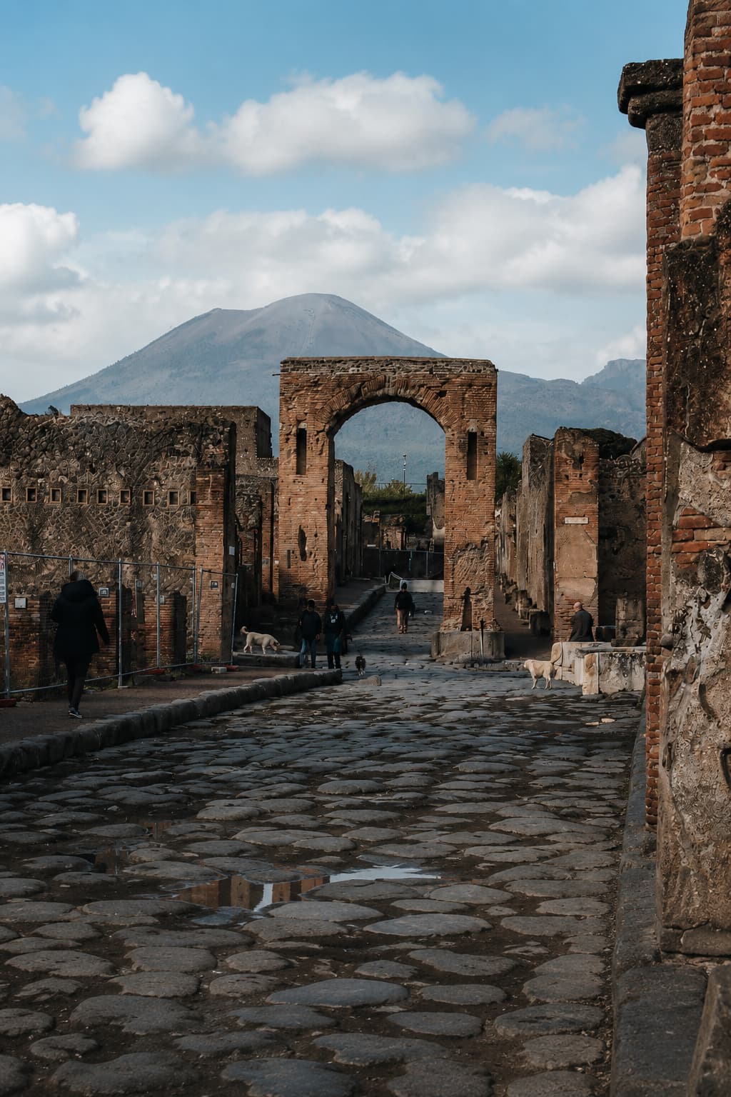 Pompeii ruins with Vesuvius behind, a popular day trip from Salerno