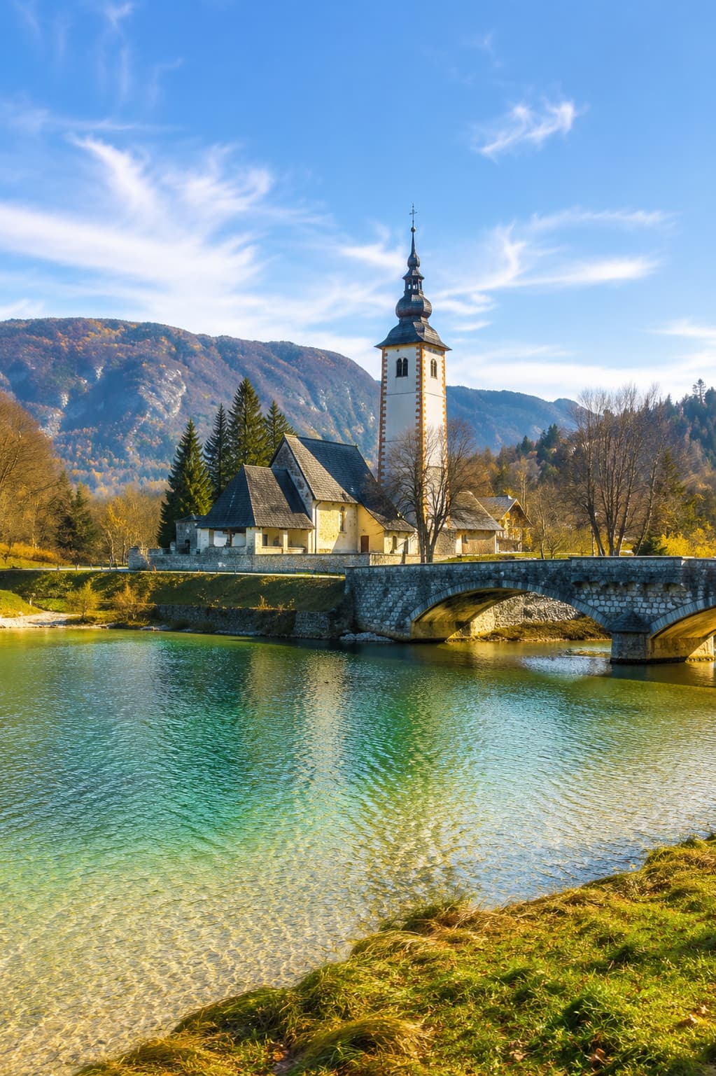 Lake Bohinj church and stone bridge, a quiet Lake Como alternative in Slovenia