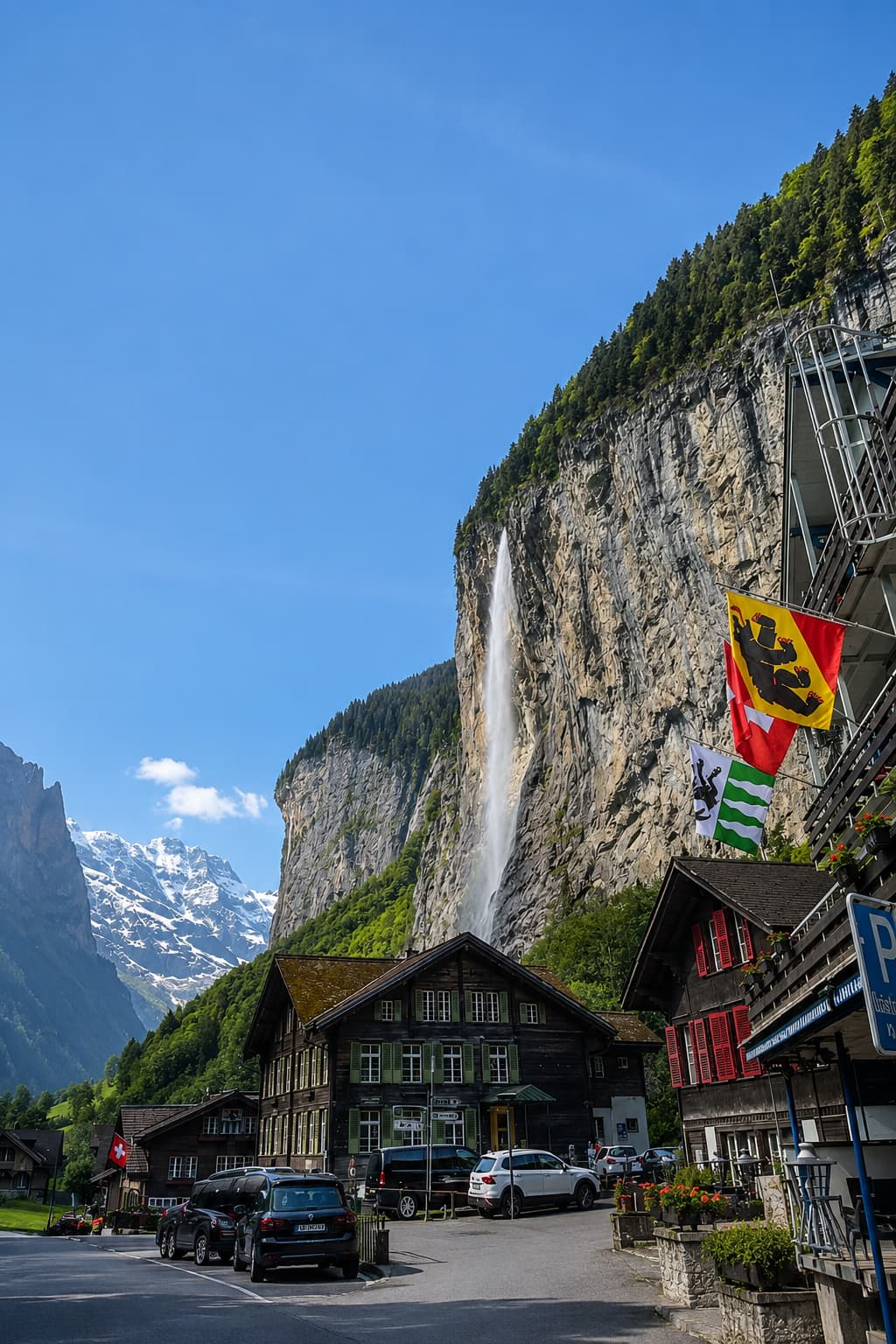 Tall waterfall dropping down a cliff above the village of Lauterbrunnen near Interlaken in the Bernese Oberland