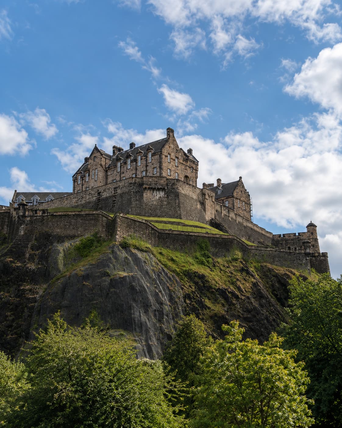 Edinburgh Castle from below rising on its volcanic plug — best Scottish castle for first-time visitors