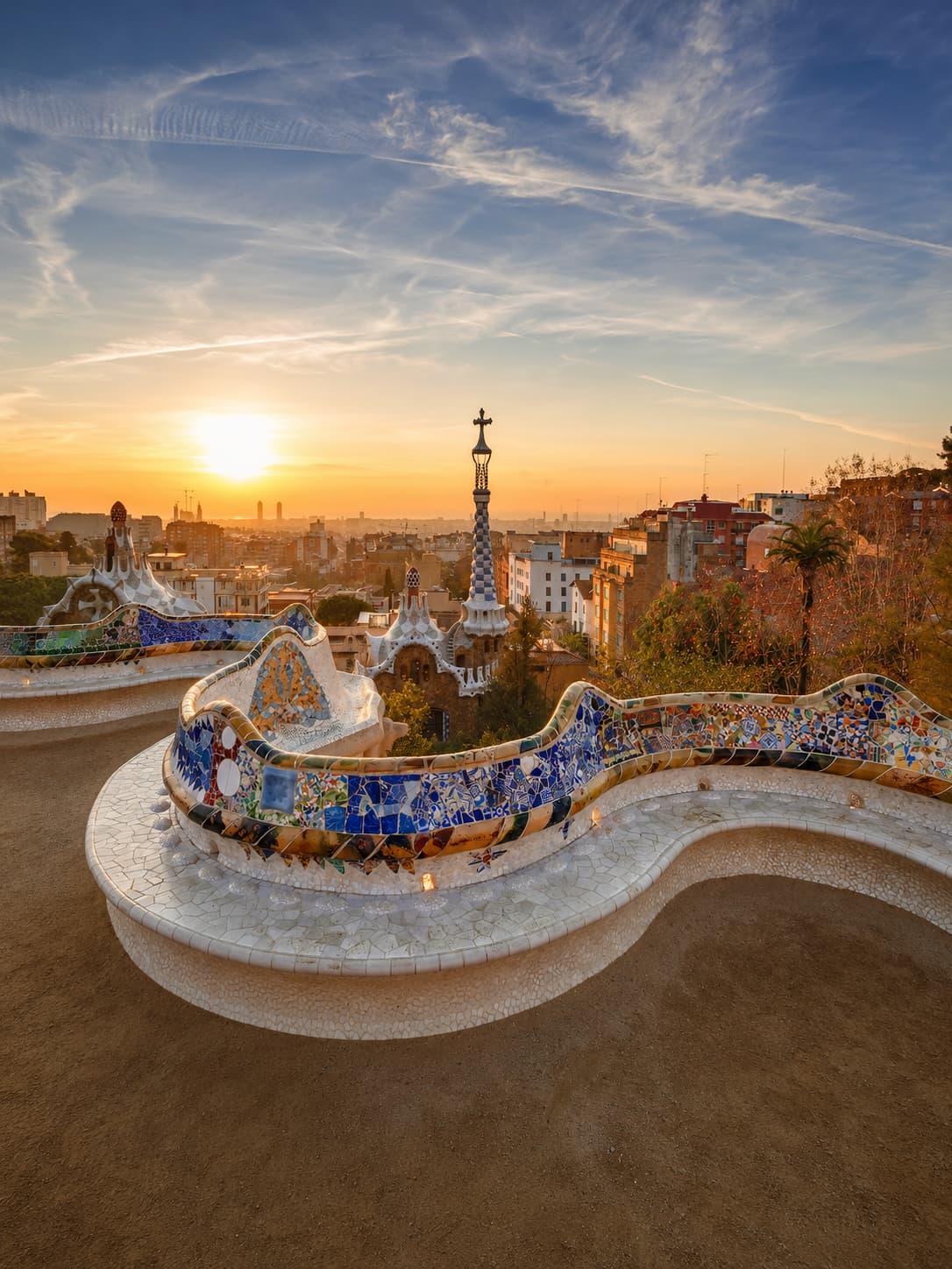 Park Güell Barcelona mosaic terrace at sunrise, best European cities in October