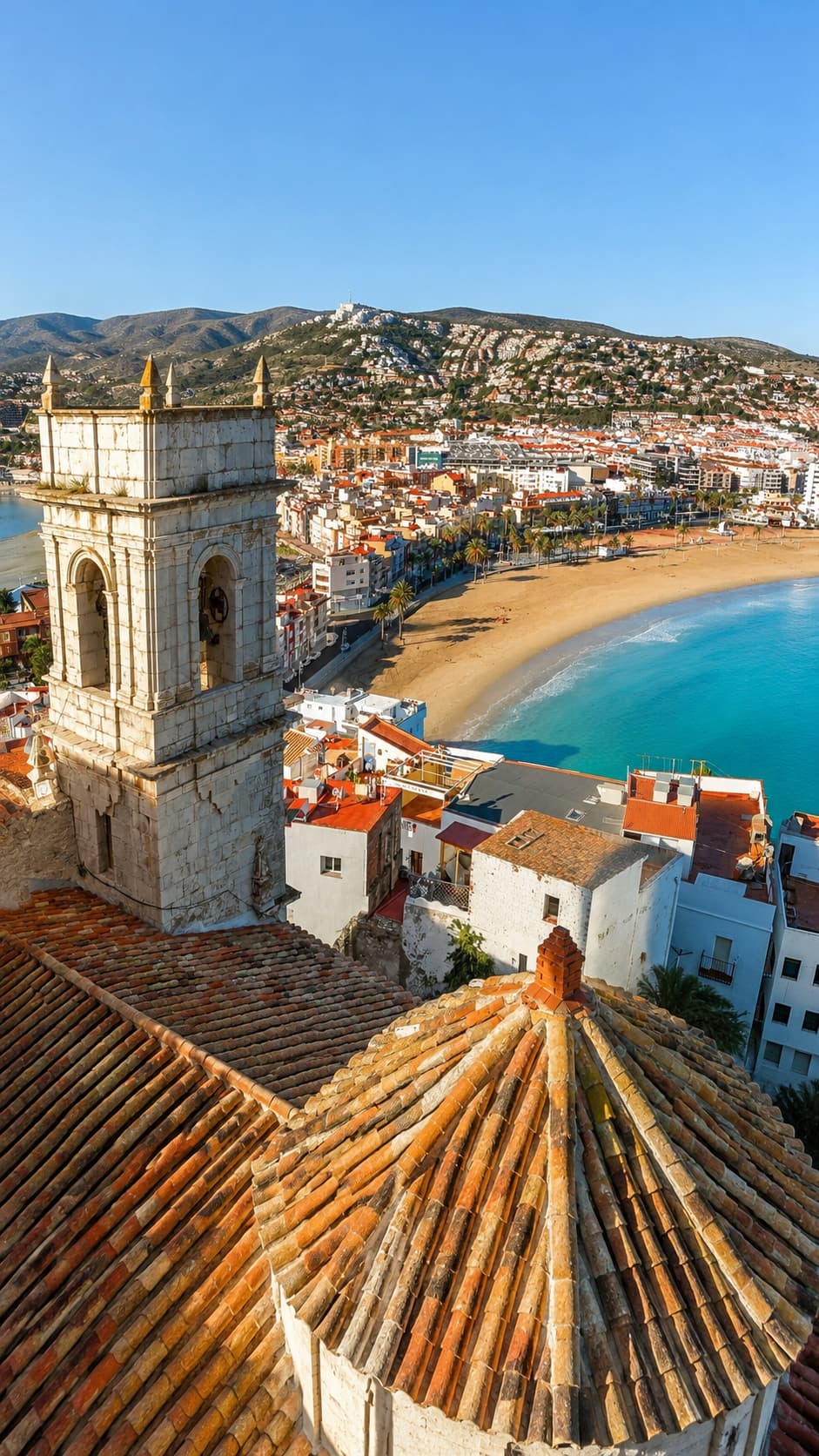 Mediterranean coastal town with turquoise sea still warm enough to swim in October