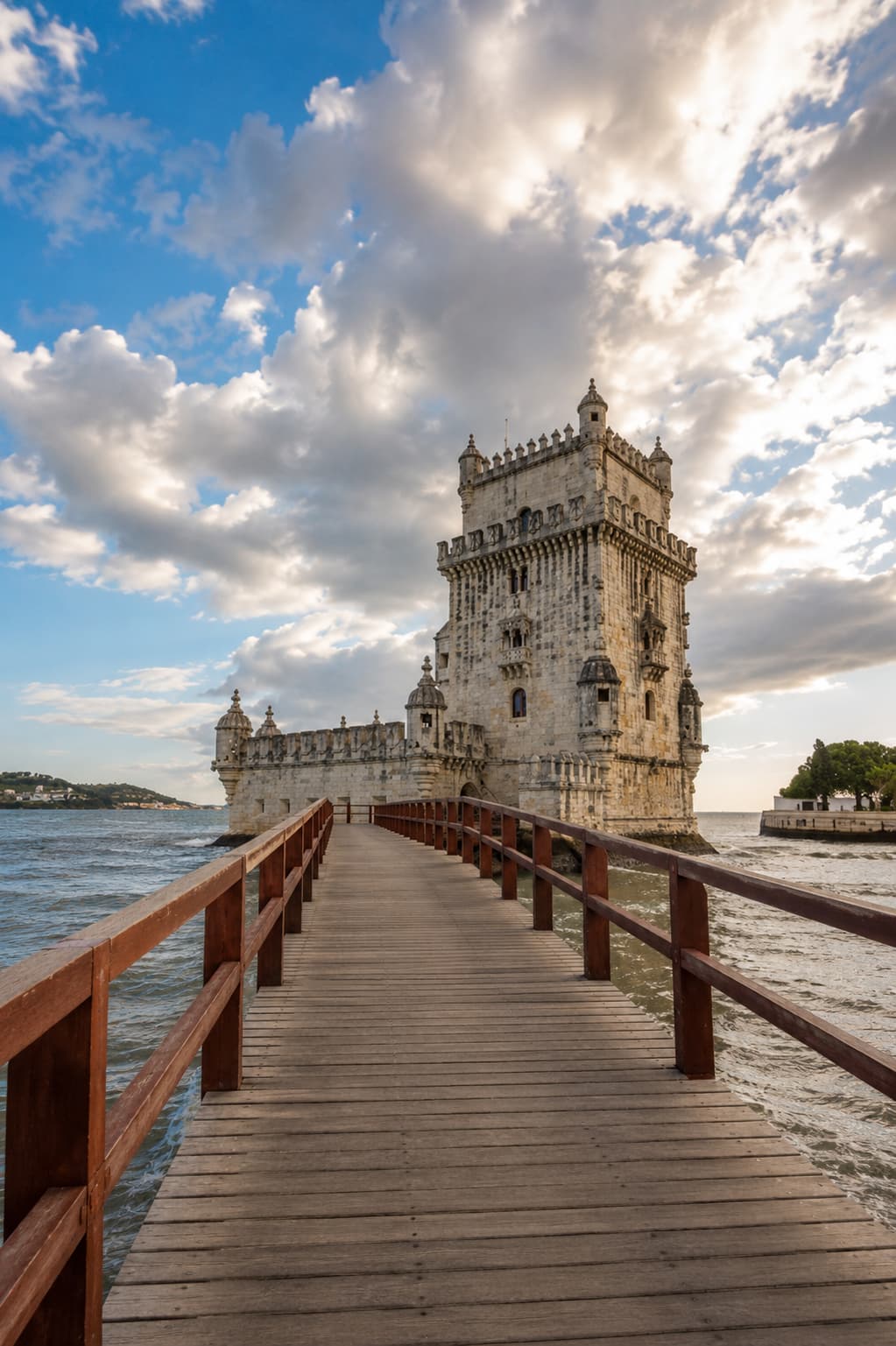 Belém Tower rising from the Tagus River approached by a wooden boardwalk, a key stop on any 3 days in Lisbon itinerary