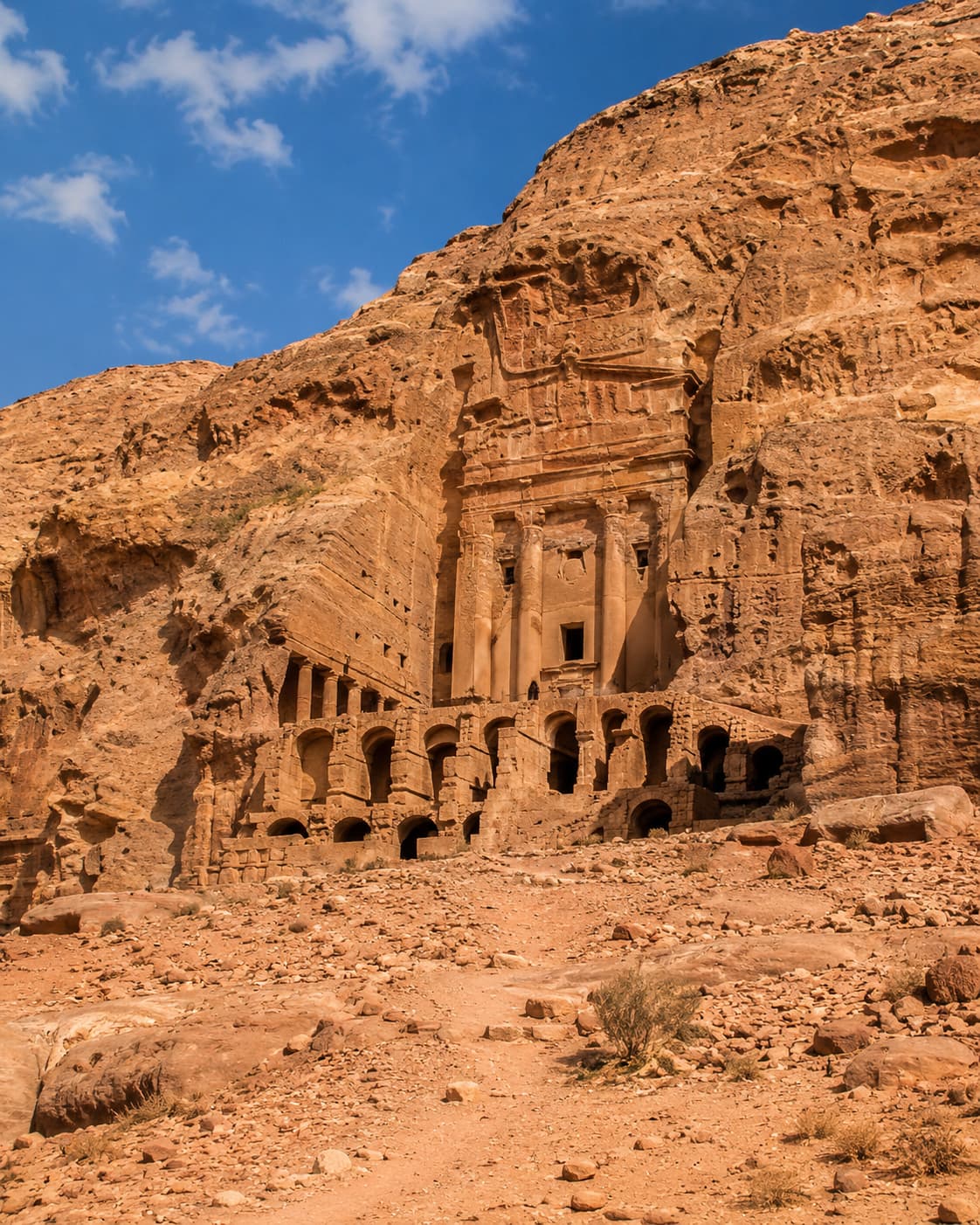 Petra travel tips — the Royal Tombs carved into rose-red sandstone cliffs in the main valley