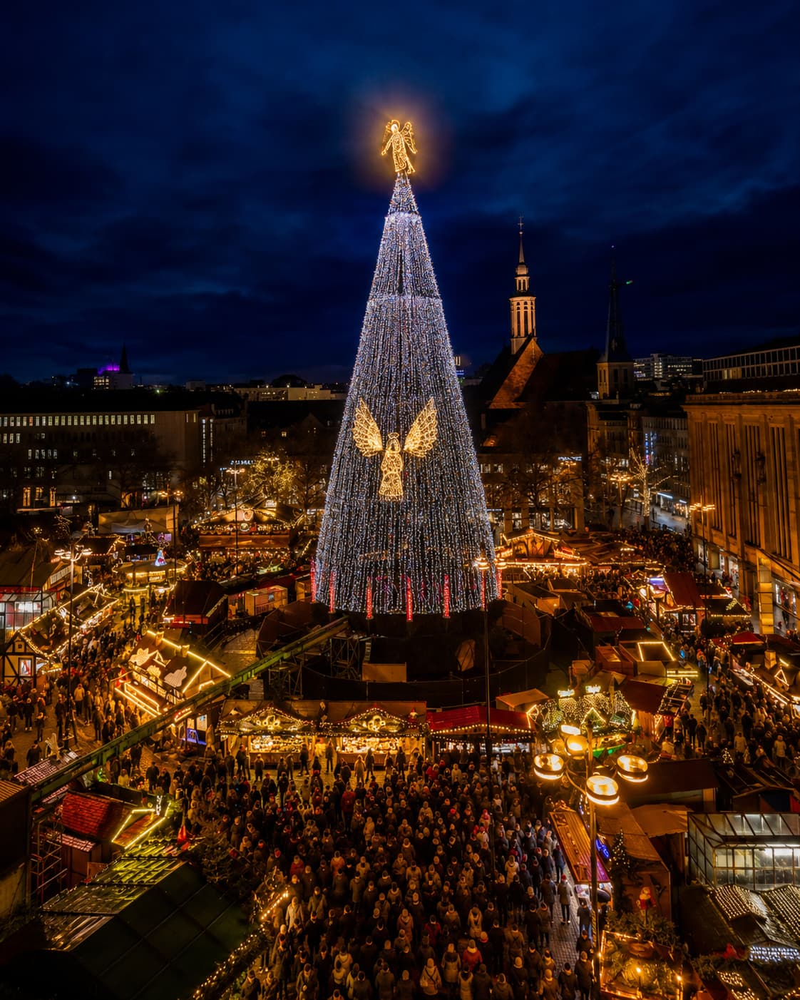 Dortmund Christmas market giant illuminated tree with angel topper — the German Christmas market that stays open past Christmas Eve until 30 December 2026