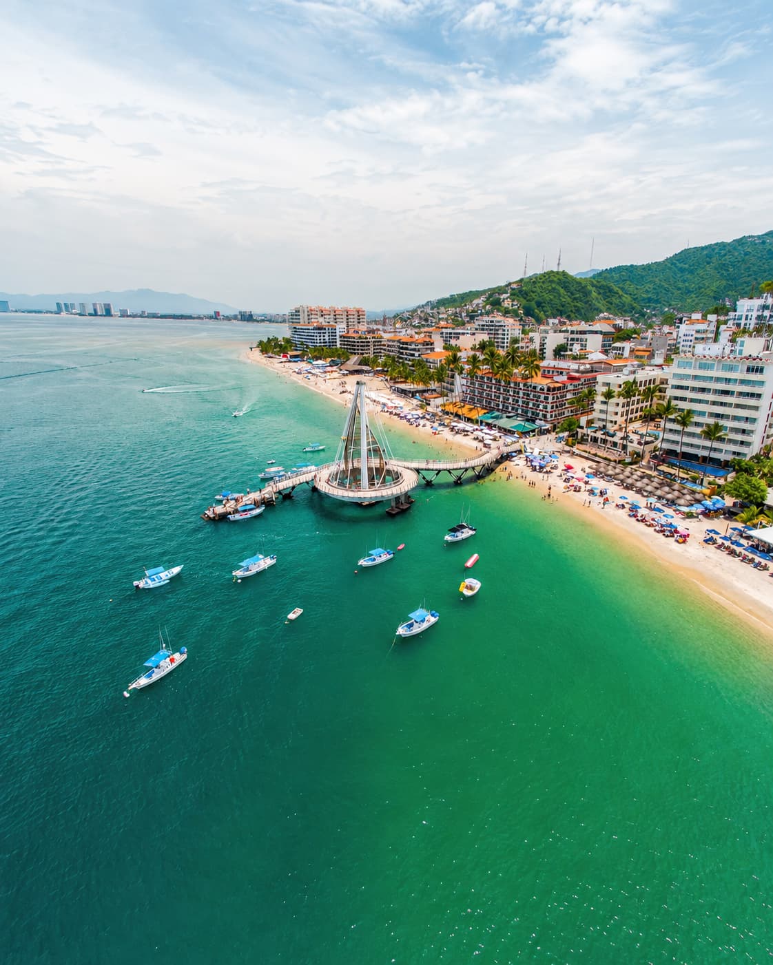 Aerial view of Puerto Vallarta's bay and Los Muertos pier, Mexico Pacific coast warm December destination