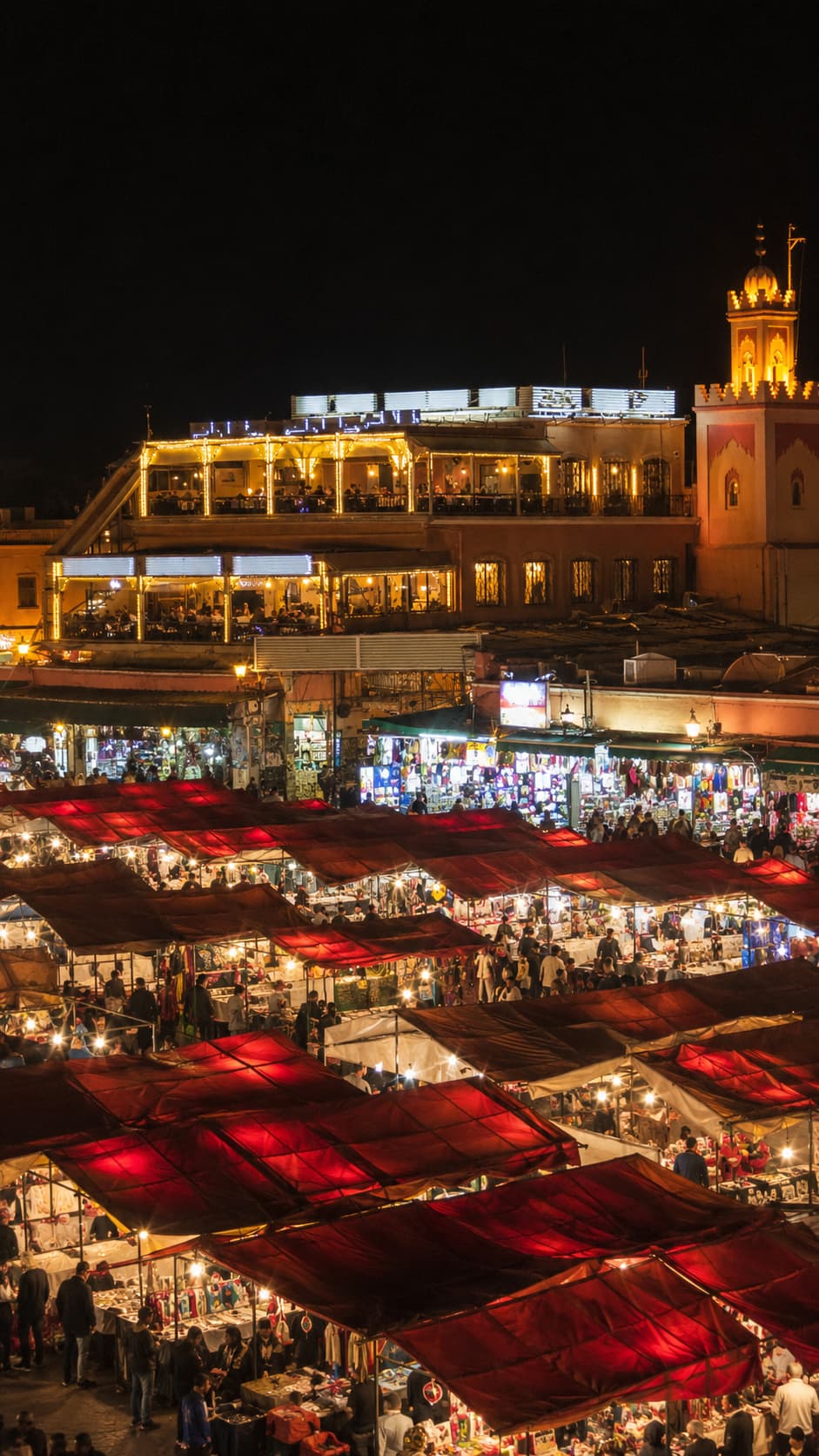 Djemaa el-Fna square in Marrakech at night with illuminated food stalls — Marrakech Morocco weather by month