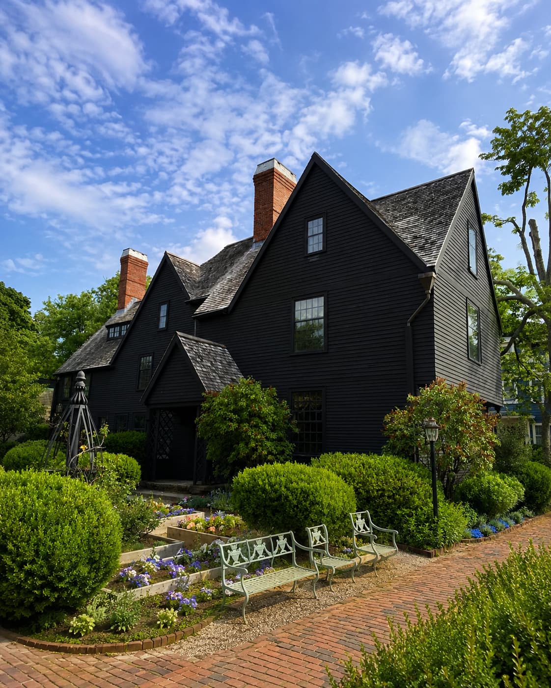 House of the Seven Gables Salem Massachusetts — 17th-century black timber-frame mansion with garden and brick path