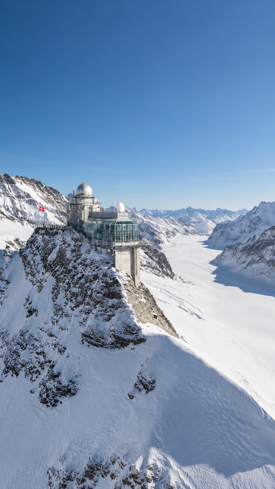 Jungfraujoch observatory perched at 3454m above the Aletsch glacier — visiting Switzerland in winter without skiing to reach Europe's highest railway station
