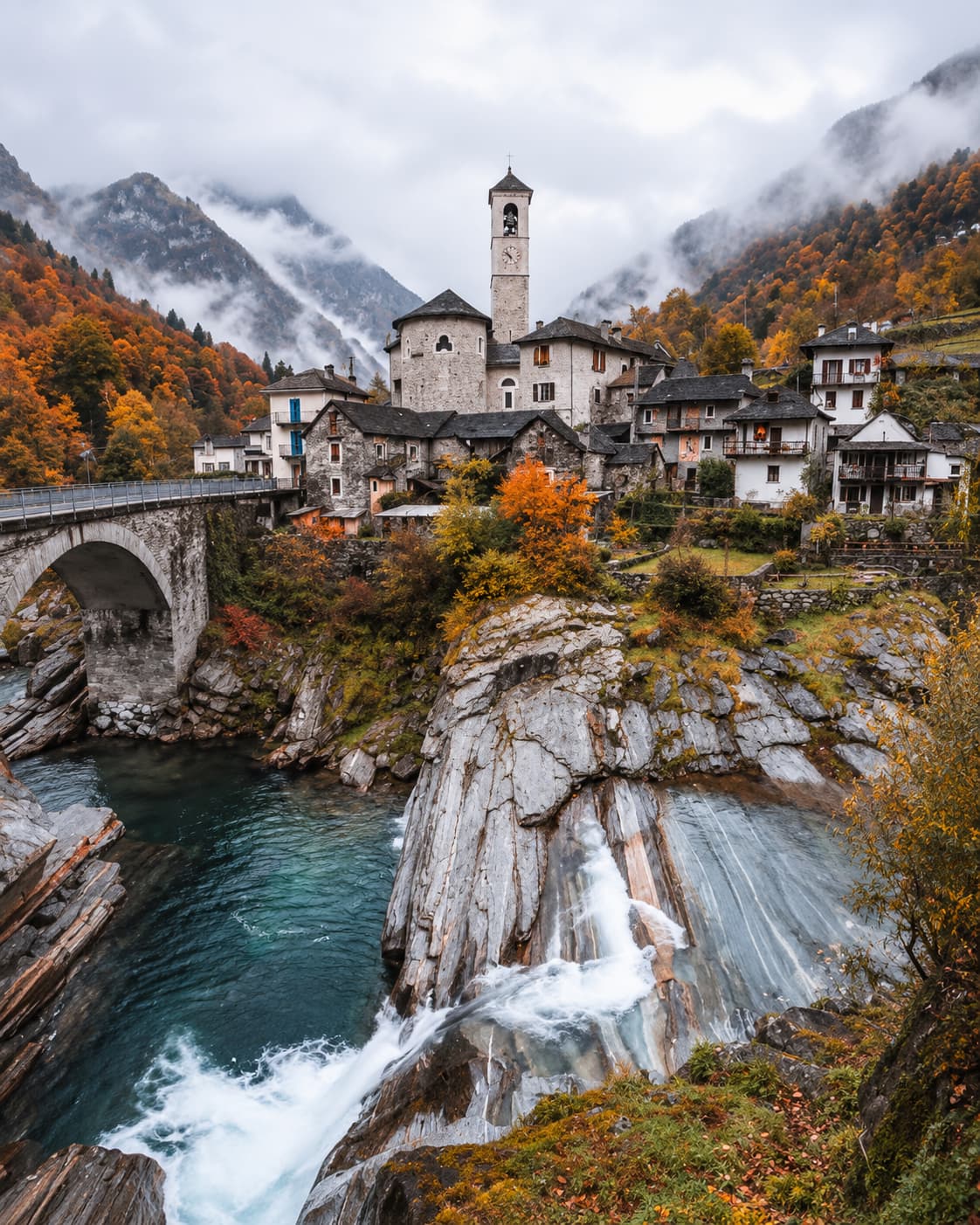 Stone village of Lavertezzo in Valle Verzasca with the emerald river, bridge, and autumn foliage