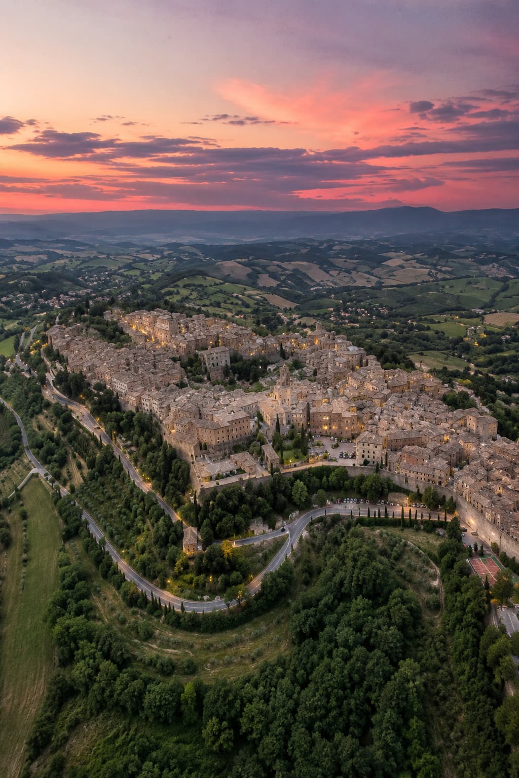 Aerial sunset view of Montepulciano's walled hill town in Tuscany in autumn
